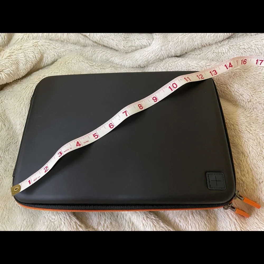 Moleskine 12” diameter for tablet/iPad, black w/ orange zipper